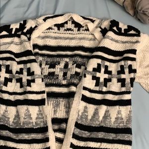 Short sleeve cardigan sweater.